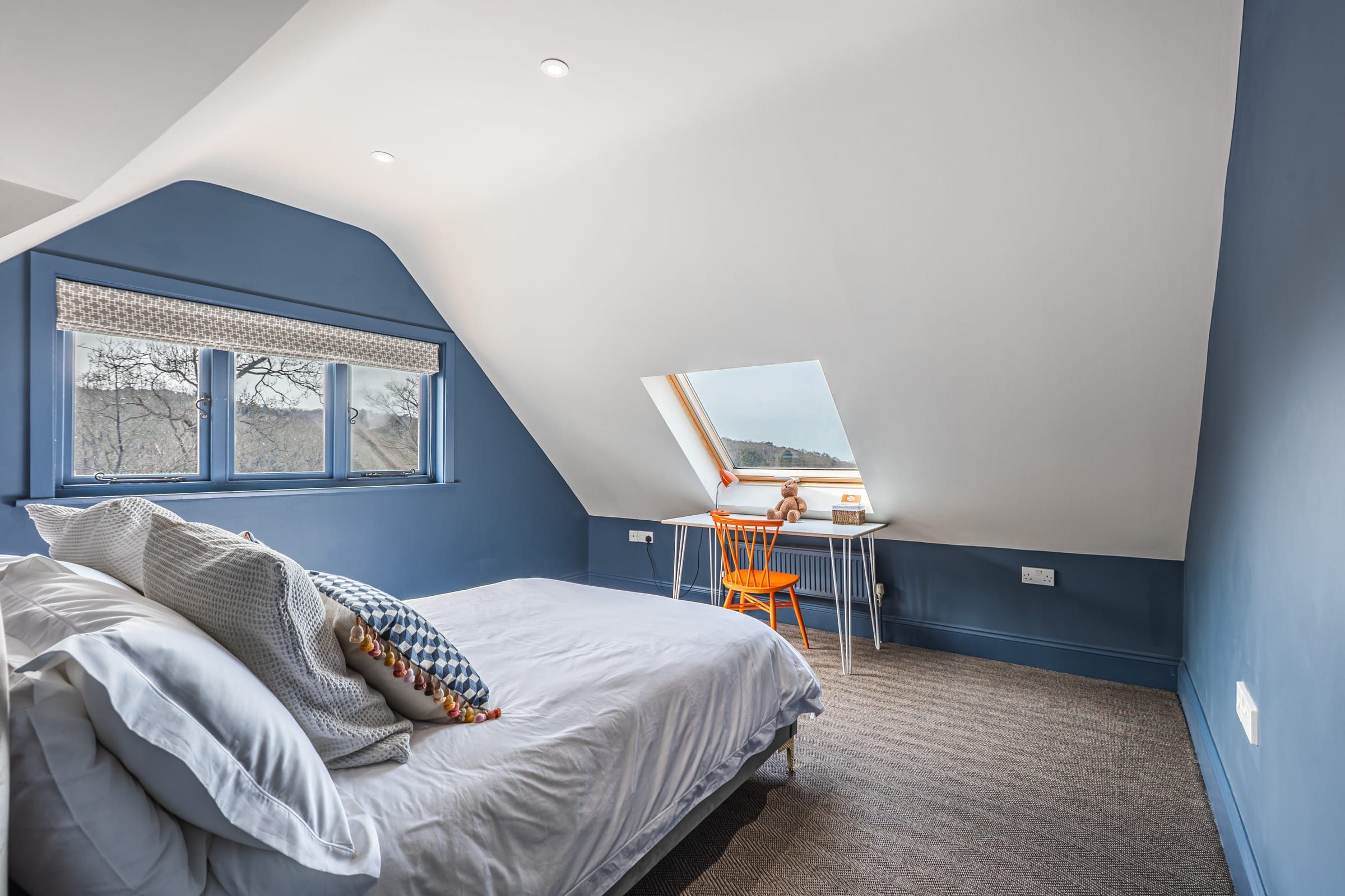 Vaulted ceiling and skylight in the loft bedroom