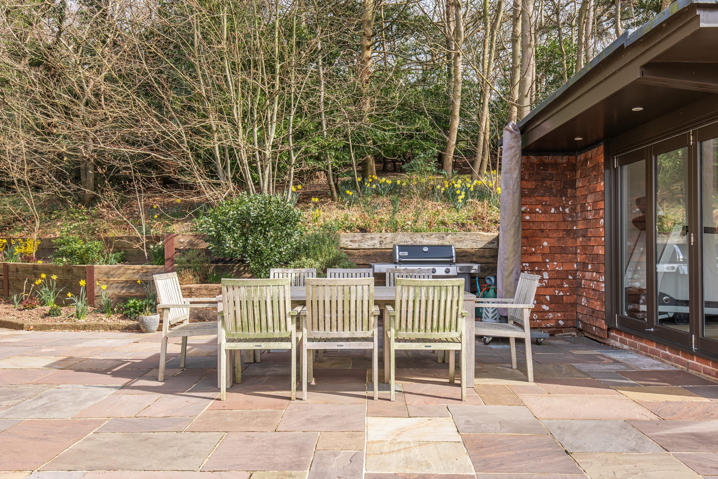 The sandstone terrace, directly accessible from the kitchen