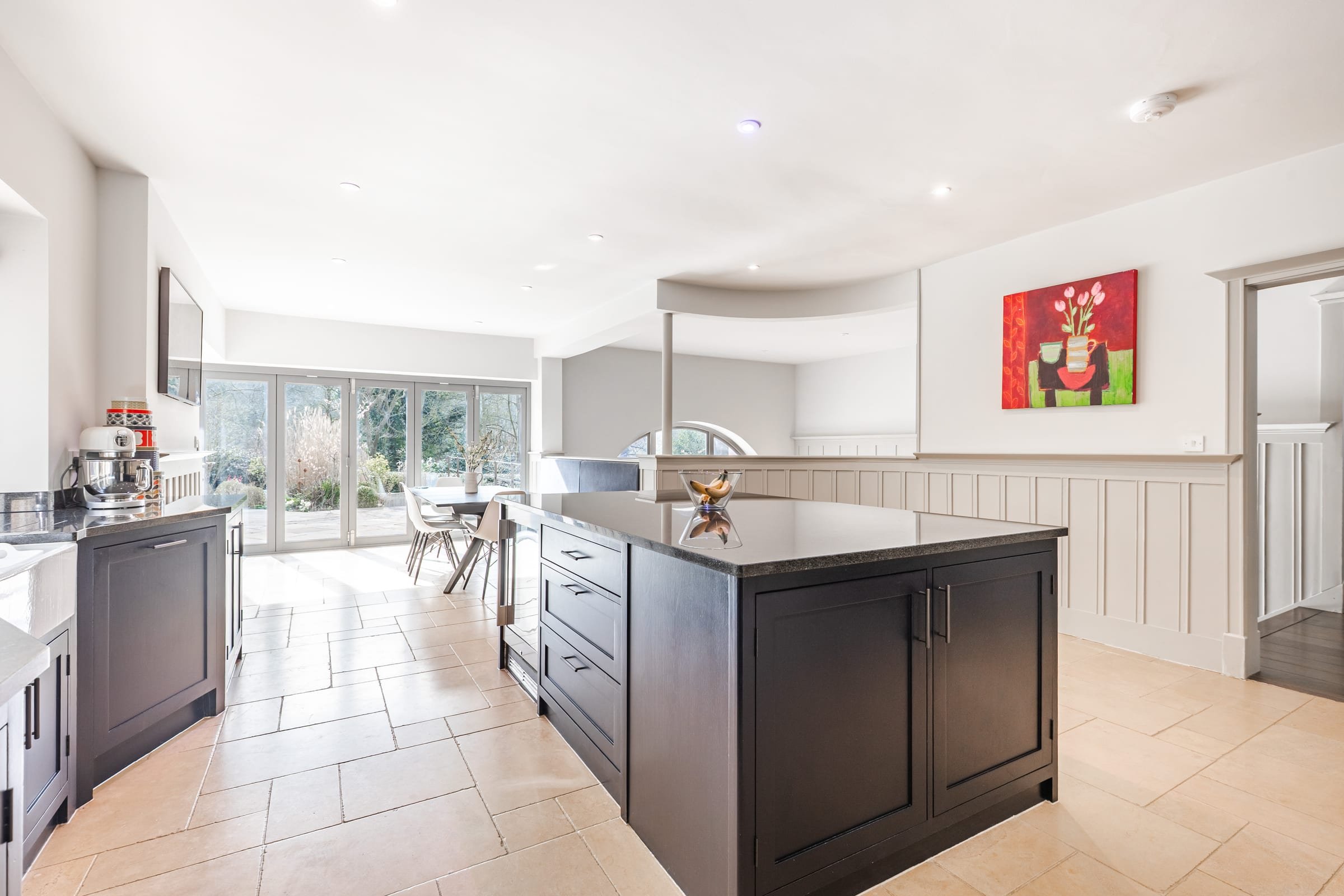 Bespoke kitchen by Naked Kitchens with Everhot cooker and granite island