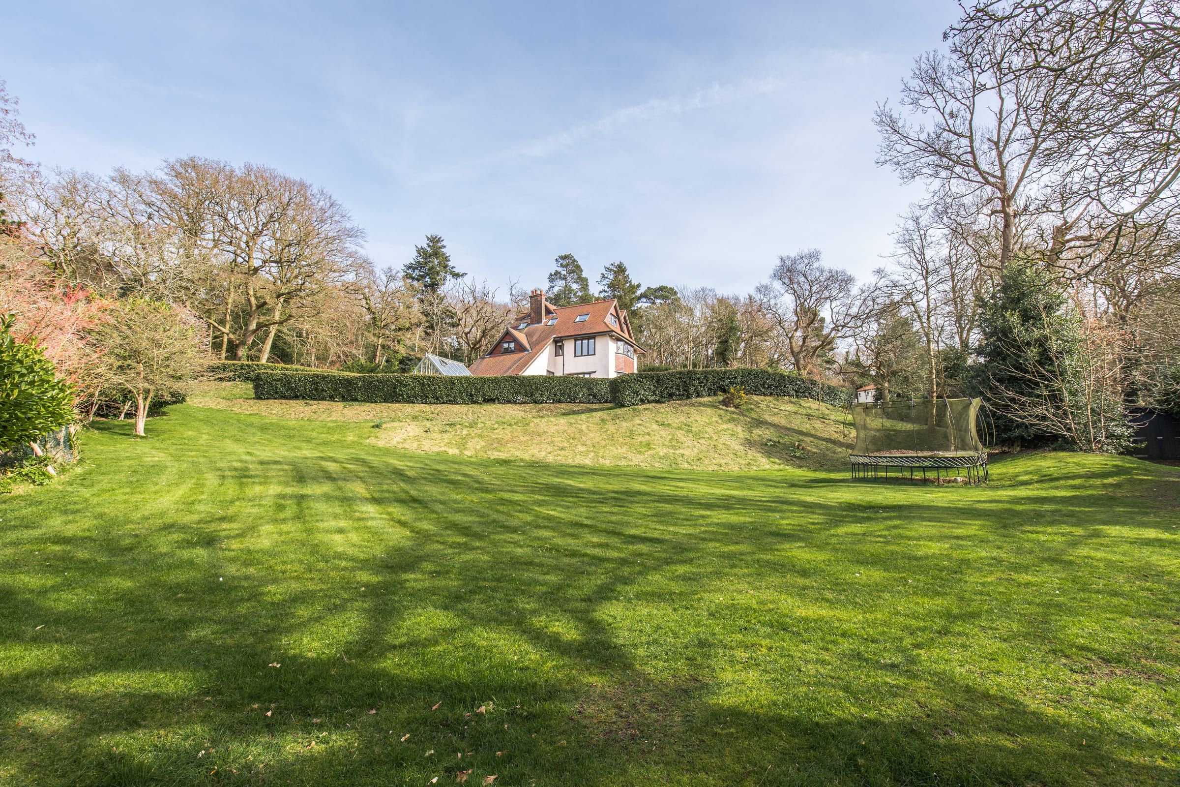 Orchid Lee viewed from the rear garden showing the sandstone terrace
